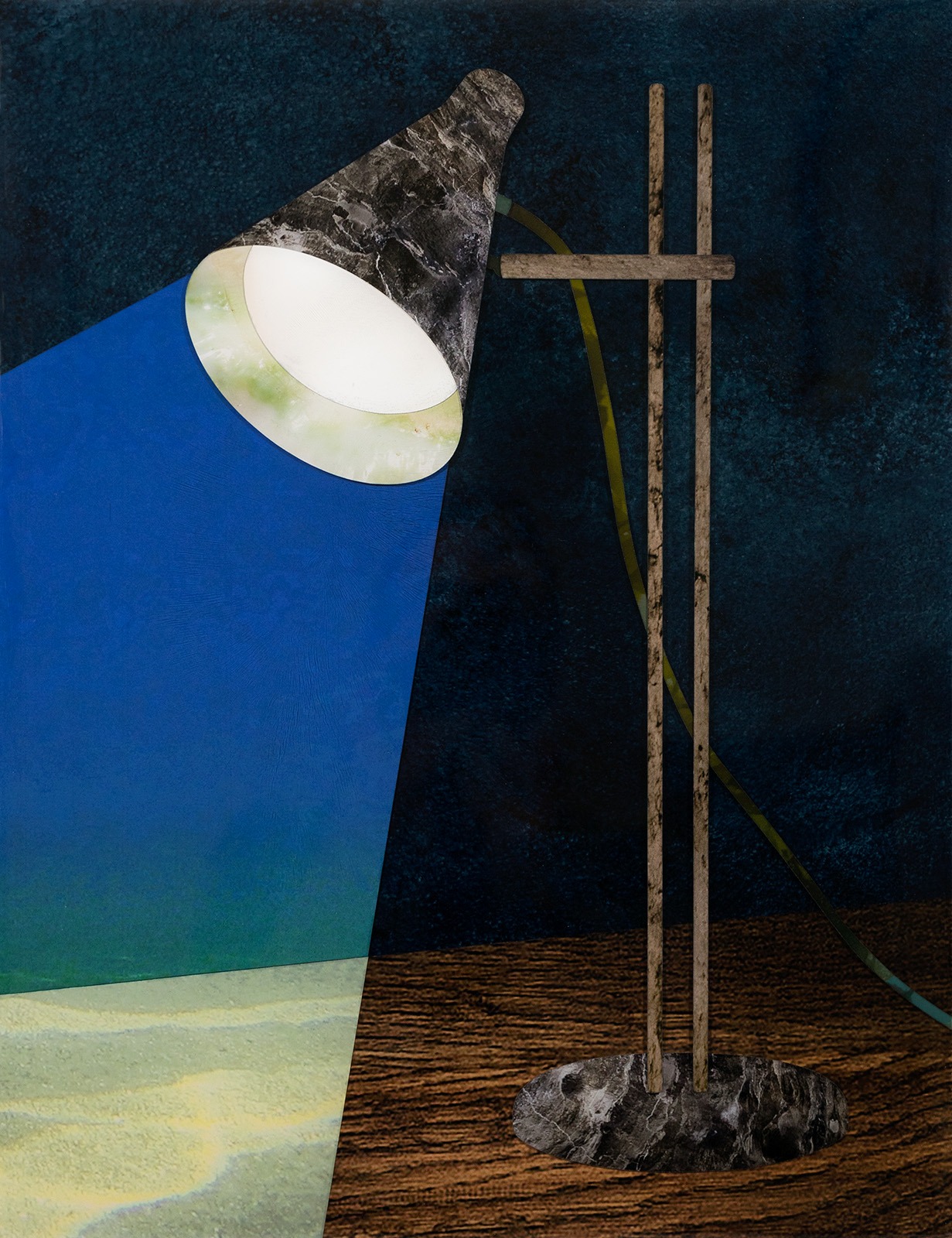 Collaged desk lamp made made of pictures of oysters, with the pearl light releasing a 